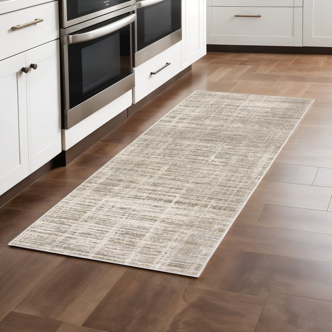2' X 8' Beige Grey Ivory Tan And Brown Abstract Power Loom Stain